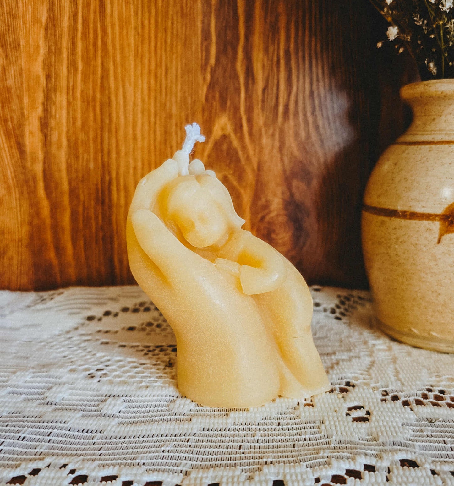 Childs Embrace - Child nurtured in Hand