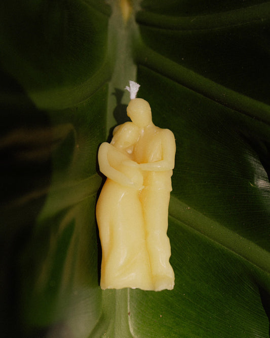 Pregnant Mother and Father Embrace